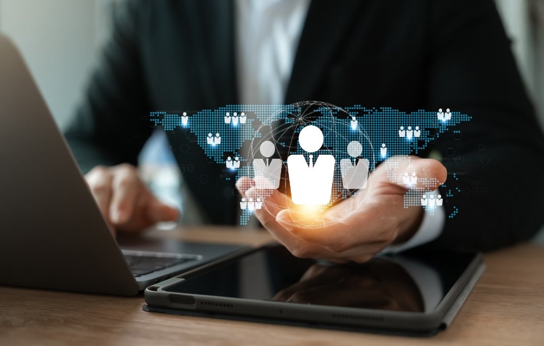 Person holding graphic of interconnected community